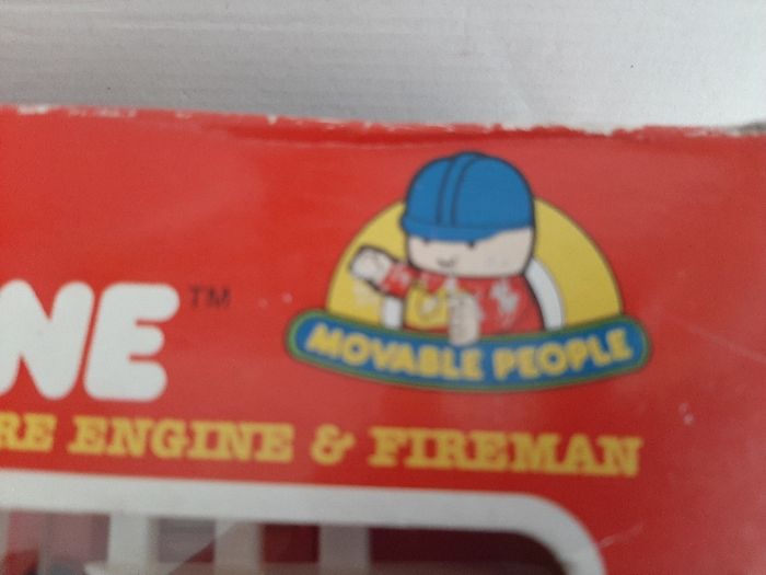 Vintage fire engine with play people and fireman Sam jigsaws