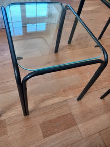 Three glass tables
