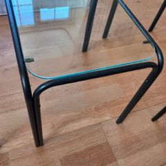 Three glass tables