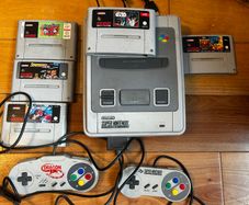 Super Nintendo with games