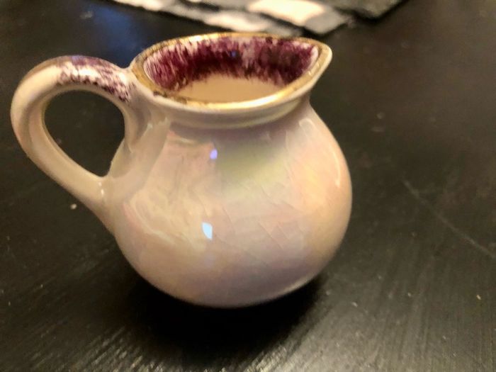 Old glazed creamer jug