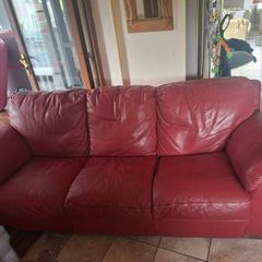 Red Leather three seater sofa