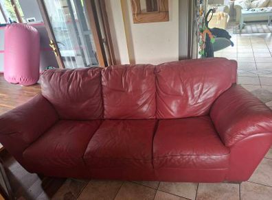 Red Leather three seater sofa