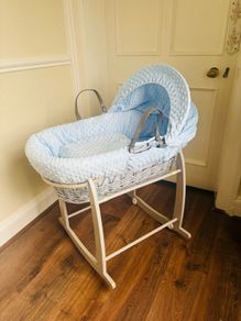 Grey and blue wicker basket  with grey rocker stand
