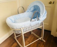 Grey and blue wicker basket  with grey rocker stand
