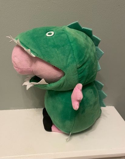 Peppa Pig in dinosaur costume