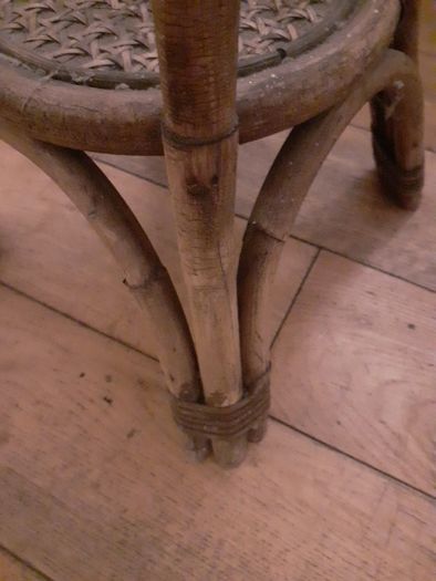 Rattan plant stand.