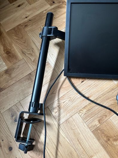 Dell monitor with adjustable stand that clamps to desk