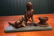 art deco brace type figure