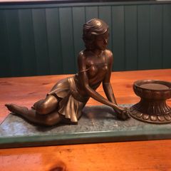 art deco brace type figure