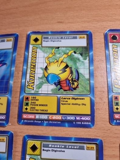 12 Rookie level Digimon cards. 1999