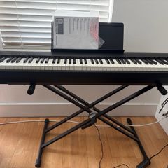 Digital piano with weighted keys - Roland FP-30X + stand + piano bag