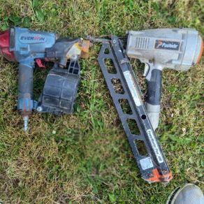 nail guns and 2 hose reels