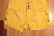 Yellow high waisted hot pants