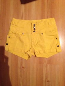 Yellow high waisted hot pants