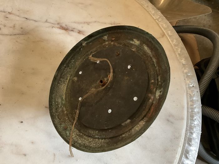 Old brass mounted glass ceiling light in a low profile