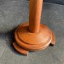 An early 20th century Art Deco oak candle holder with brass top. 122cm Image 2