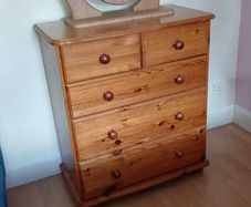 Chest of drawers and mirror