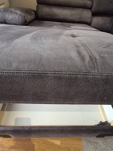 dark grey corner sofa with sleeping and storage