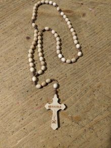 handmade wooden rosary from Medjugorje featuring a cross with the town's name engraved on it. New never used