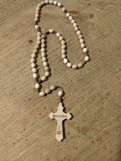 handmade wooden rosary from Medjugorje featuring a cross with the town's name engraved on it. New never used