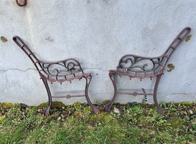 Pair cast iron children's bench ends