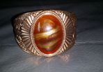 Beautiful large gold colour costume bracelet size M/L as new