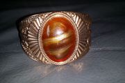 Beautiful large gold colour costume bracelet size M/L as new