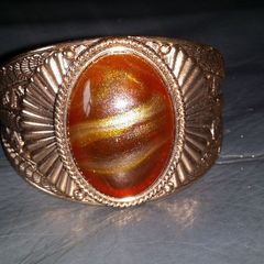 Beautiful large gold colour costume bracelet size M/L as new