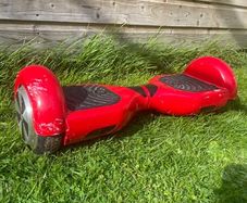 Red Hoverboard. Fully Working With Charger Included