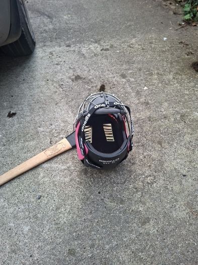 hurling helmet and hurl