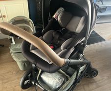 Nuna travel system including isofix base