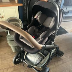 Nuna travel system including isofix base
