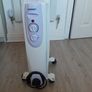 Oil filled electric radiator heater on castors 1500W like new Image 2