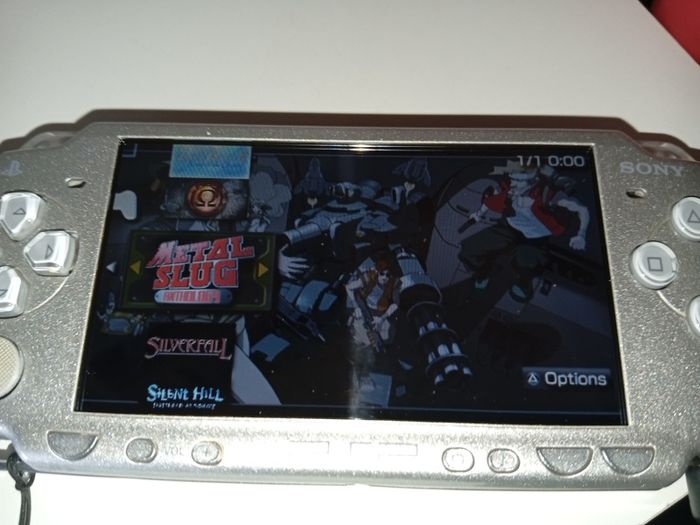 Sony Silver PSP 2003 Console - Works with Digital Games but wont load UMD Disks 16gb sd inc