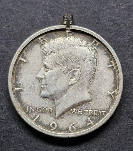 United States 1/2 Dollar "Kennedy Half Dollar" 90% Silver coin in Bezel