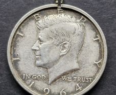 United States 1/2 Dollar "Kennedy Half Dollar" 90% Silver coin in Bezel