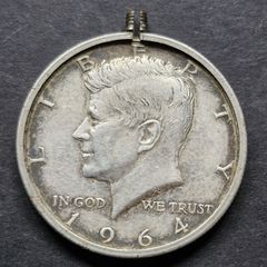 United States 1/2 Dollar "Kennedy Half Dollar" 90% Silver coin in Bezel