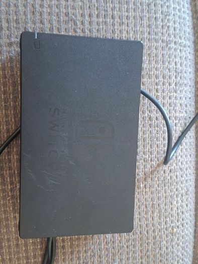 Portable Nitendo Switch, charging dock.