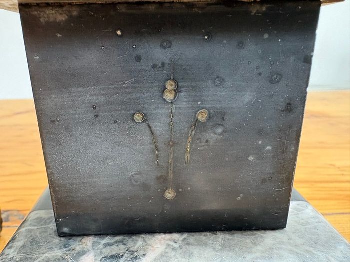 Matching pair of antique marble, slate and brass ornaments.
