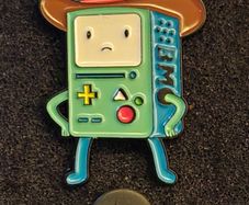 BMO , pin back badge.