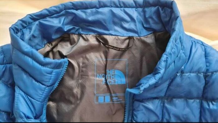 Mens gillet, blue, North Face, size US medium. Aisa L