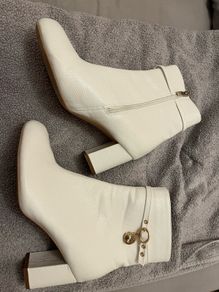 Women's white heeled boots with gold design