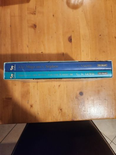 The Chronicals Of Narnia Compilation.  2 Books In Presentation Folder. Large Volume Hardback In Very Good Condition.