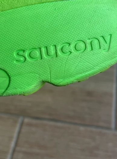 Green Saucony hurricane 25 runners