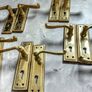 6 pairs of polished brass door handles Image 2