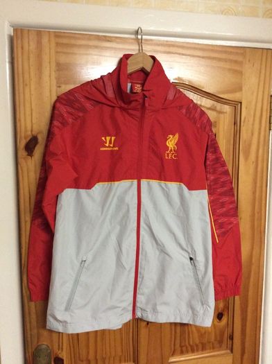 Liverpool FC. Official Warrior Windcheater. Xtra Large Boys / Mens Small.