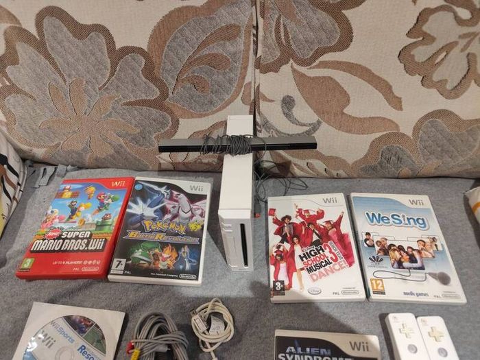 Wii Bundle with Pokemon, Mario Bros, Sports and Sports Resorts