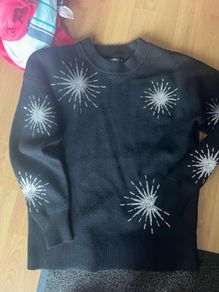 Brand new dunnes soft black wool jumper with silver design