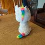 This is a Ty Beanie Boos Pixy the White Unicorn plush toy with large, glittery eyes Image 4